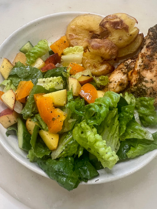 Smashed potatoes with peach salsa and chicken